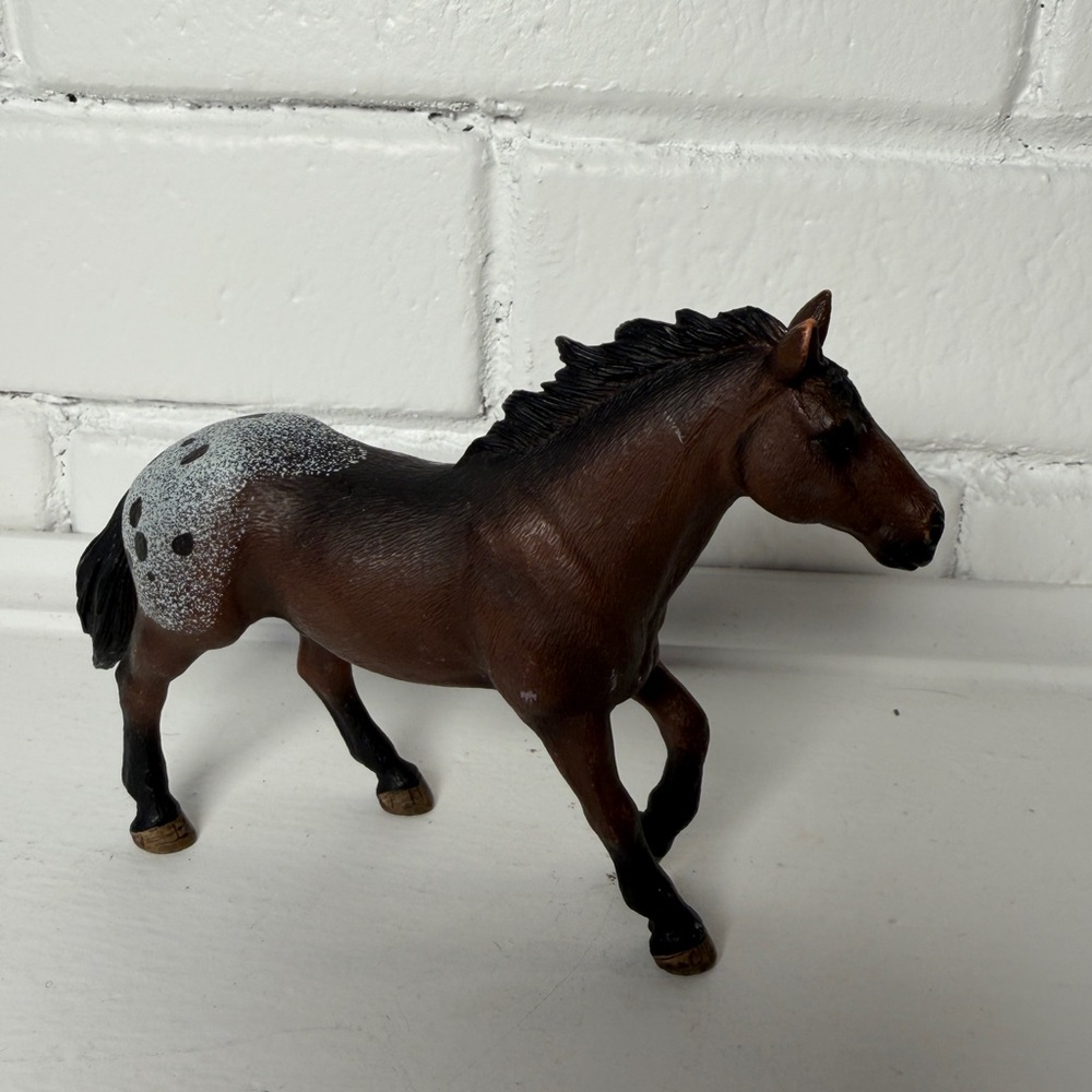 Brown and White Horse Figurine